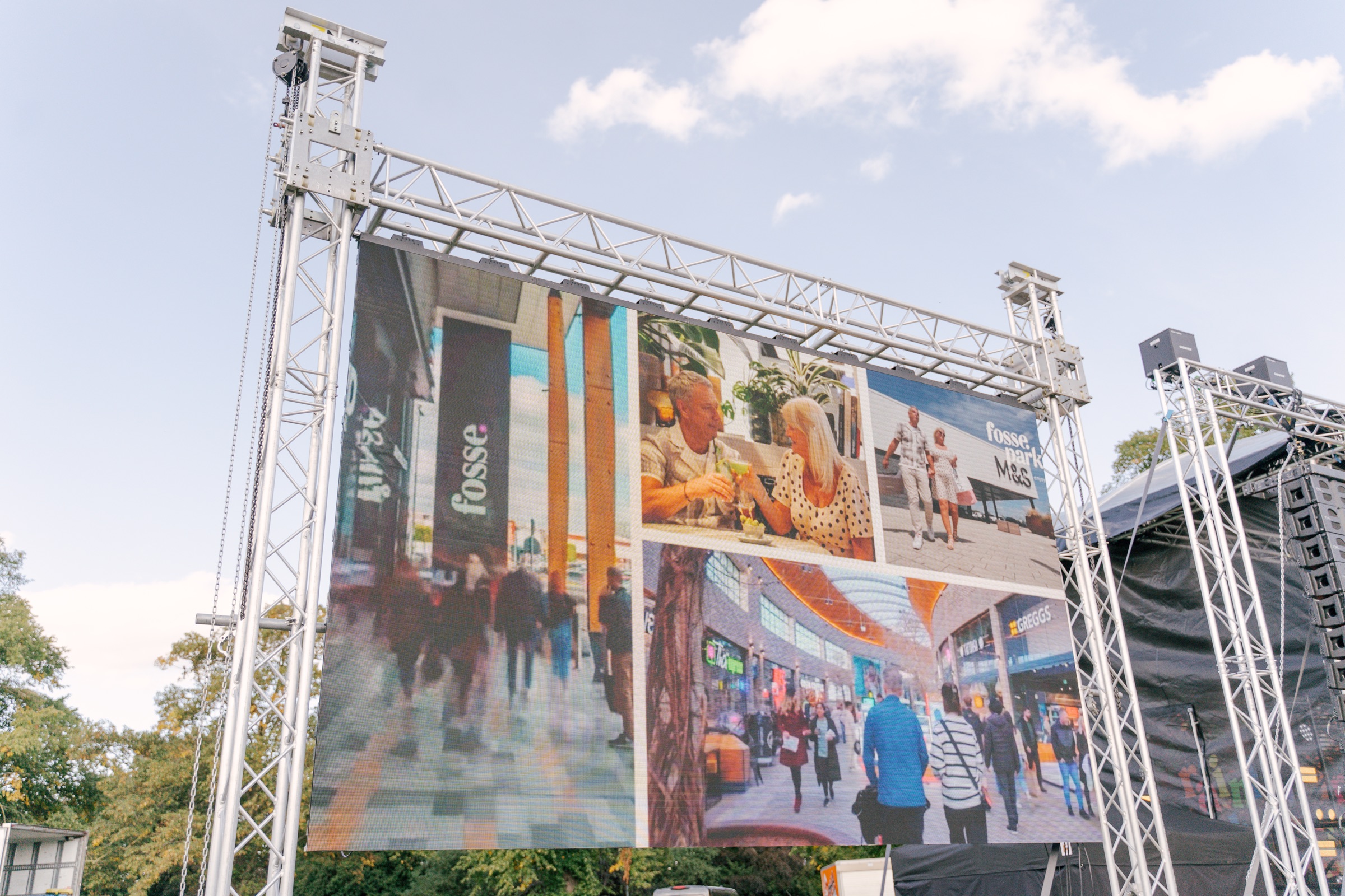 Outdoor LED screen structure beside the Leicester Pride 2026 stage